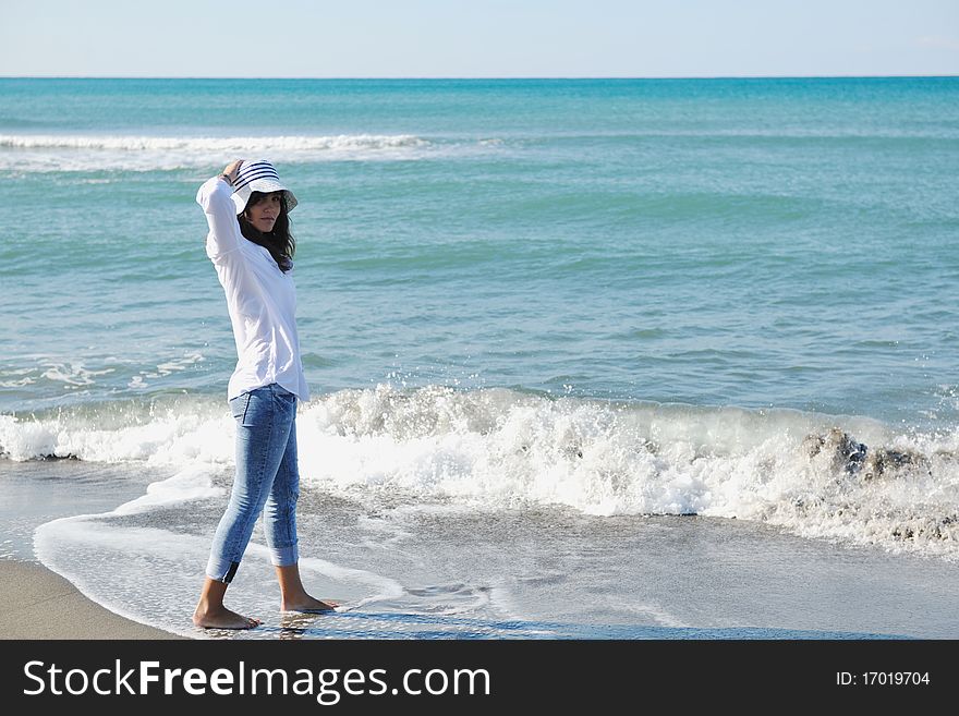 Happy young woman relax onbeautiful beach at morning. Happy young woman relax onbeautiful beach at morning