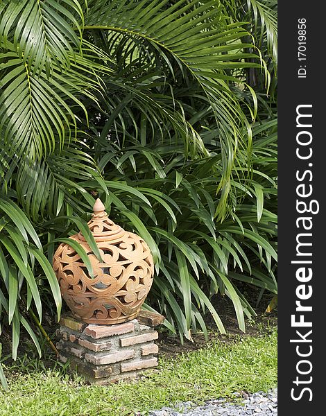 Terracotta lantern earthenware garden decoration in zen stone garden. Terracotta lantern earthenware garden decoration in zen stone garden