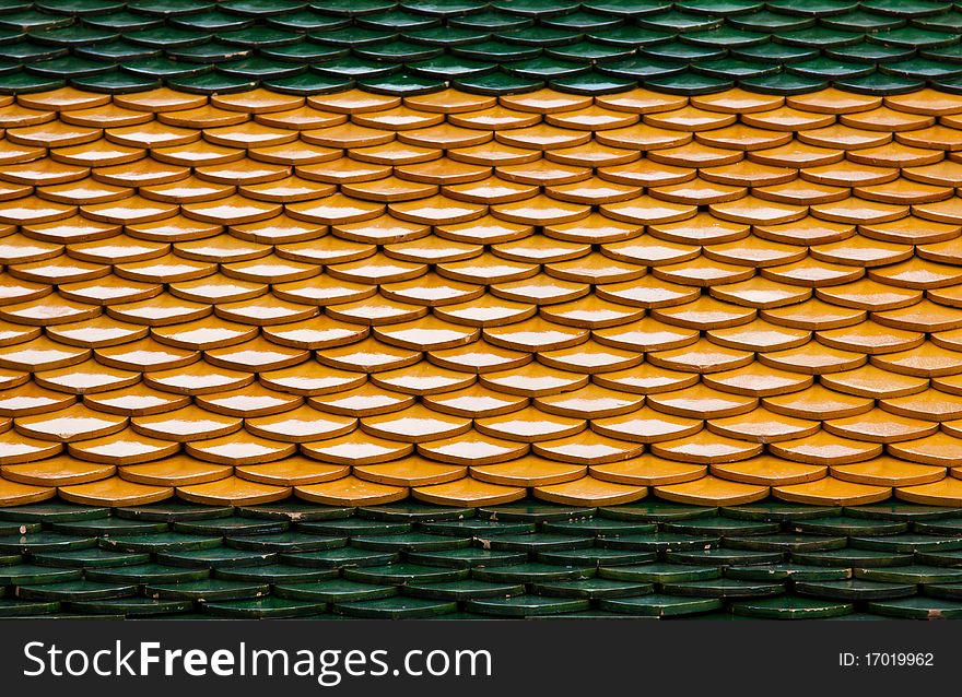 Traditional Thai style on temple's roof tile