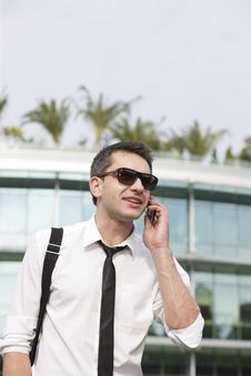 Manager Speak On Phone Across Office Stock Photos Manager Speak On Phone Across Office Stock Photos