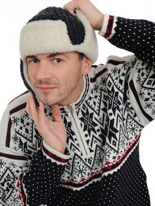 Expressions.Funny Winter Man In Warm Hat Listening Stock Photo