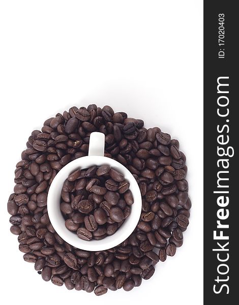 Cup Of Dark Roasted Coffee Beans