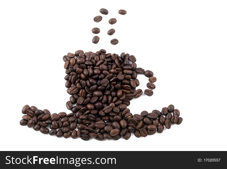 Dark roasted coffee beans in the shape of a coffee cup isolated on white. Dark roasted coffee beans in the shape of a coffee cup isolated on white