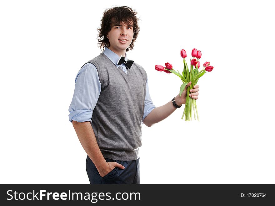 An image of a young boy with red flowers