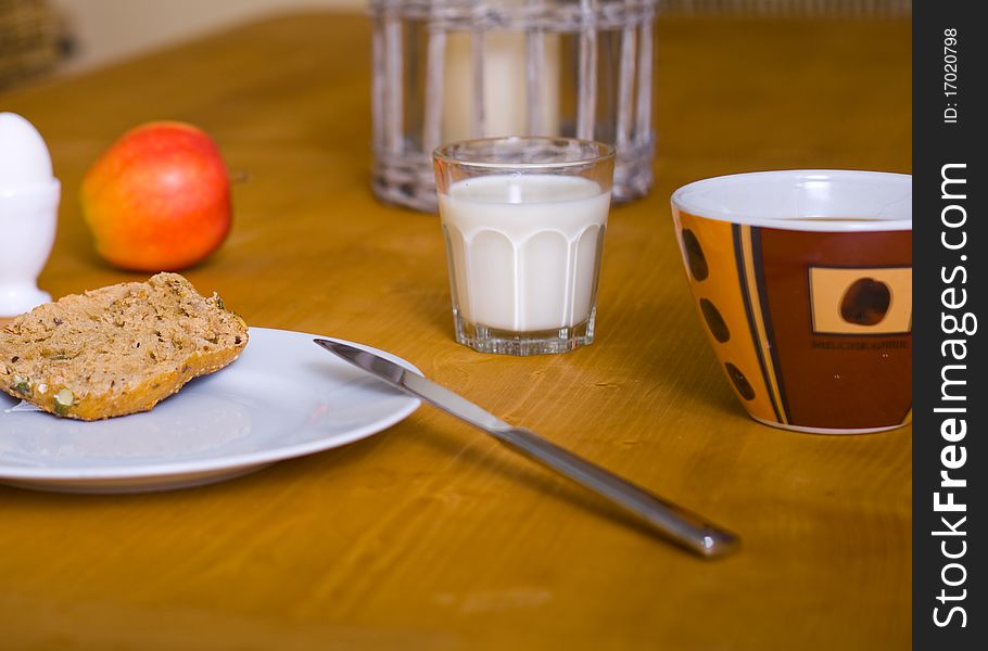 Breakfast scene on a table with foods. Breakfast scene on a table with foods
