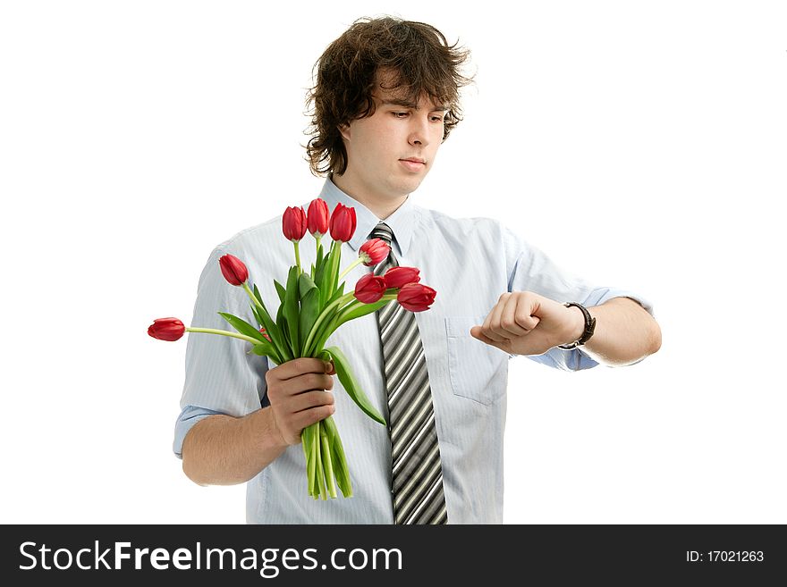 A portrait of a young man with red tulips. A portrait of a young man with red tulips