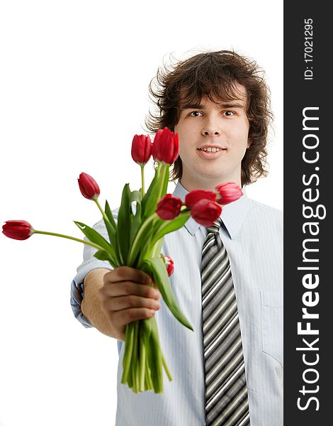 A portrait of a young man with red tulips. A portrait of a young man with red tulips