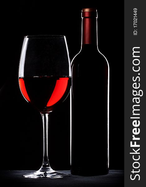Red wine bottle and glass silhouette