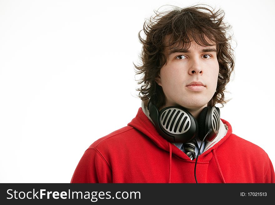 An image of a young man with big headphones. An image of a young man with big headphones