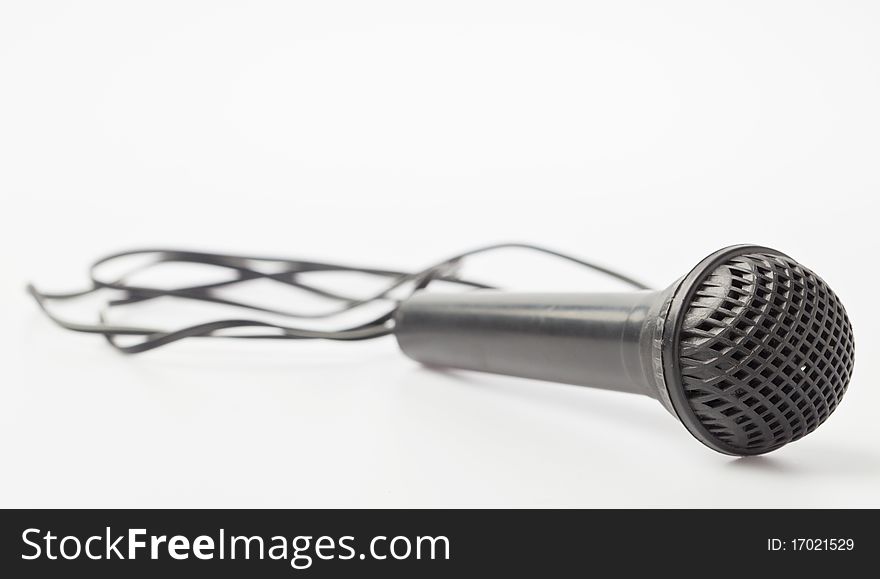 Microphone toy with wire white back ground. Microphone toy with wire white back ground