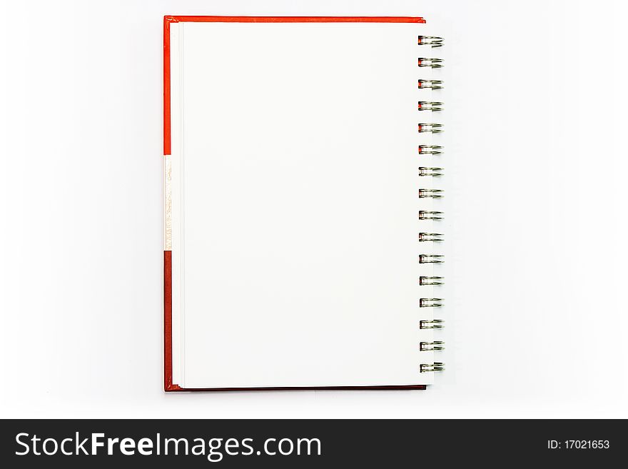 Face notebook paper on brown wood texture with natural patterns