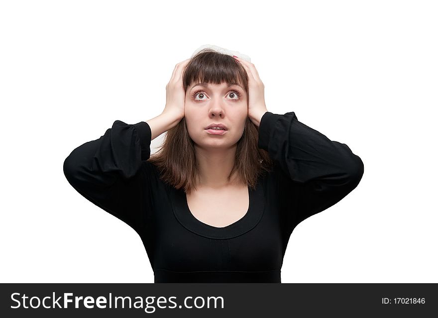 The girl is very surprised and frightened on a white background