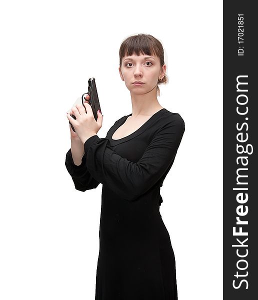 A girl with a black handgun on white background. A girl with a black handgun on white background