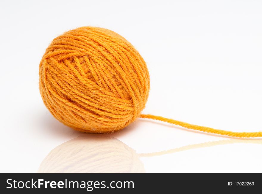 Knitting thread on white background
