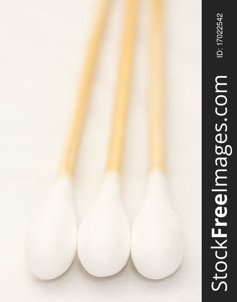 Cotton buds on white background