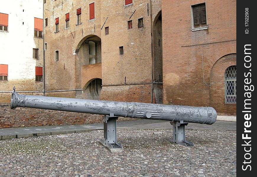 Antique cannon situated in front of Estense castle in Ferrara, Italy. Antique cannon situated in front of Estense castle in Ferrara, Italy.