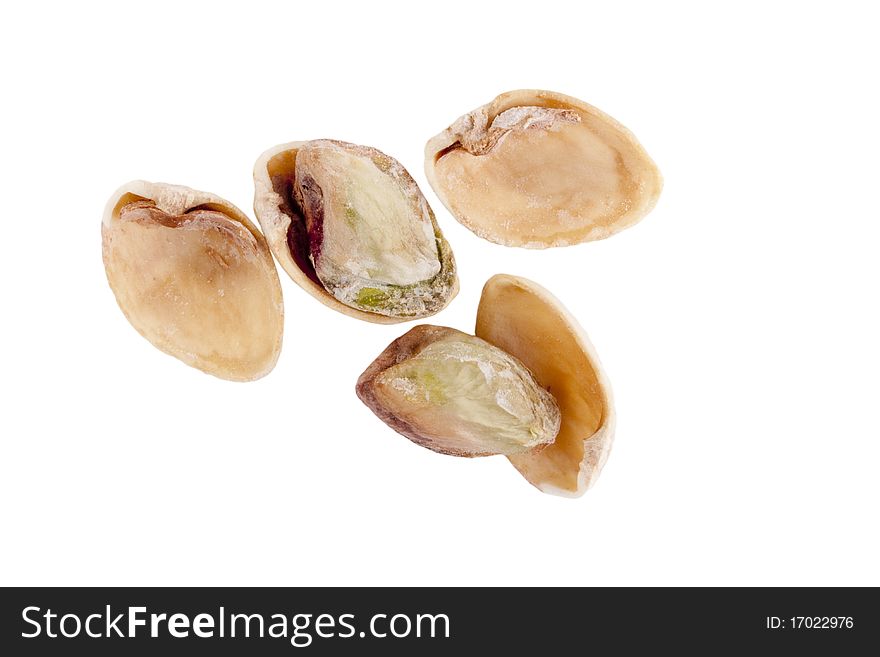 Open pistachios isolated on a white background.