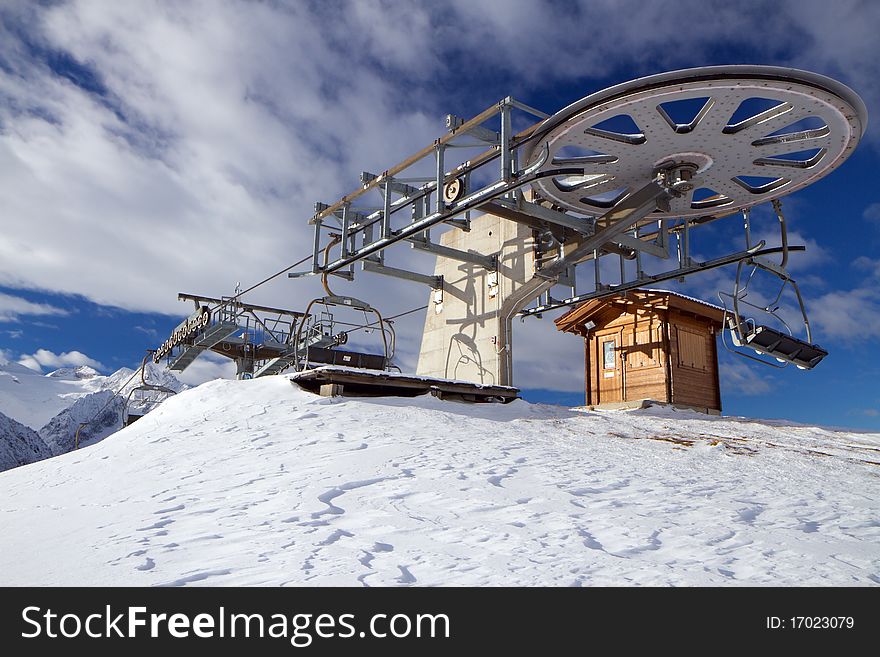 Chair lift on Nigritella Peak (2.089 meters on the sea-level) near Tonale Pass. Brixia province, Lombardy region, Italy