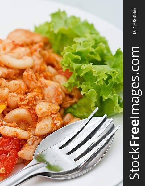 Macaroni fried with chicken and vegetables. Macaroni fried with chicken and vegetables