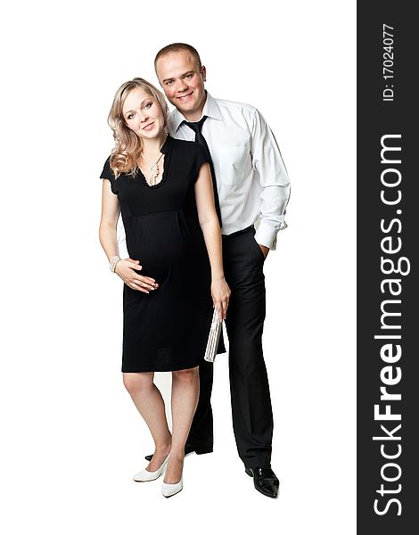 An image of a young pregnant woman and her husband. An image of a young pregnant woman and her husband