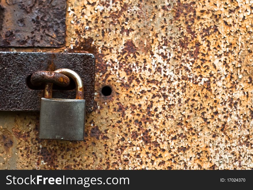 Old rusty padlock for background. Old rusty padlock for background