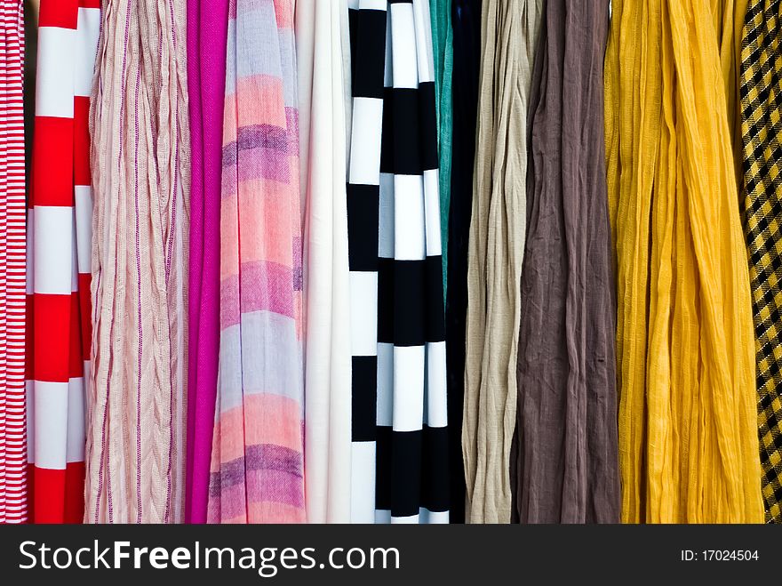 Lots of colorful cloth towels as a background or texture. Lots of colorful cloth towels as a background or texture