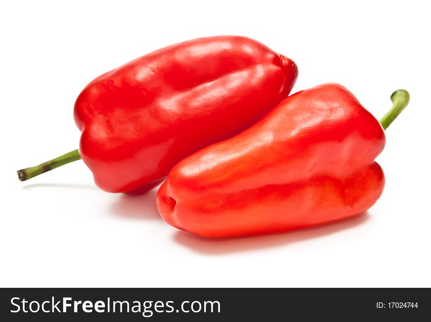 Two red peppers isolated on white background. Two red peppers isolated on white background
