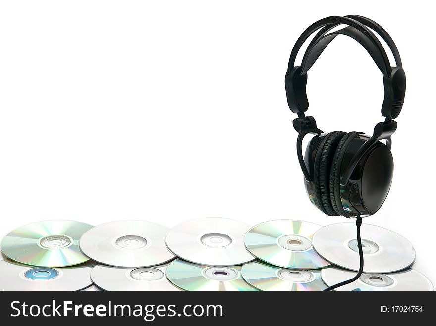 Black headphones and dvd. Studio shot