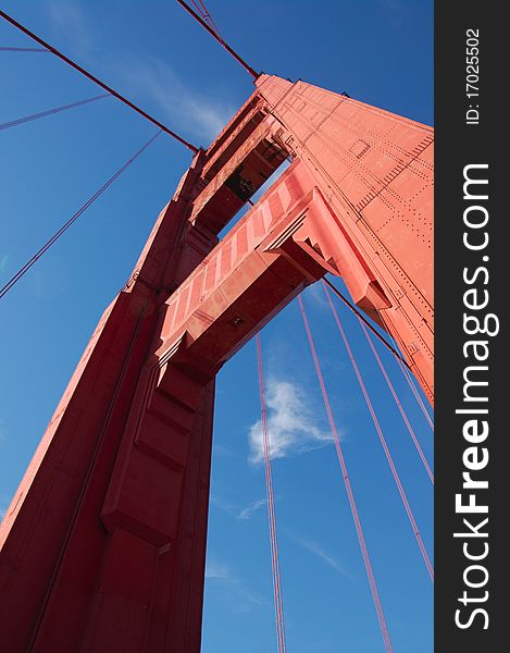 Fragment view on Golden Gate bridge in daylight, vertical. San-Francisco, California, USA. Fragment view on Golden Gate bridge in daylight, vertical. San-Francisco, California, USA