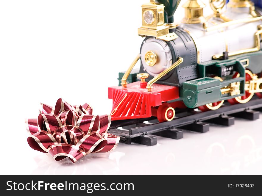 Christmas Bow with Holiday Toy Train. Christmas Bow with Holiday Toy Train