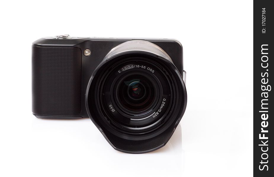 The black digital camera on a white background