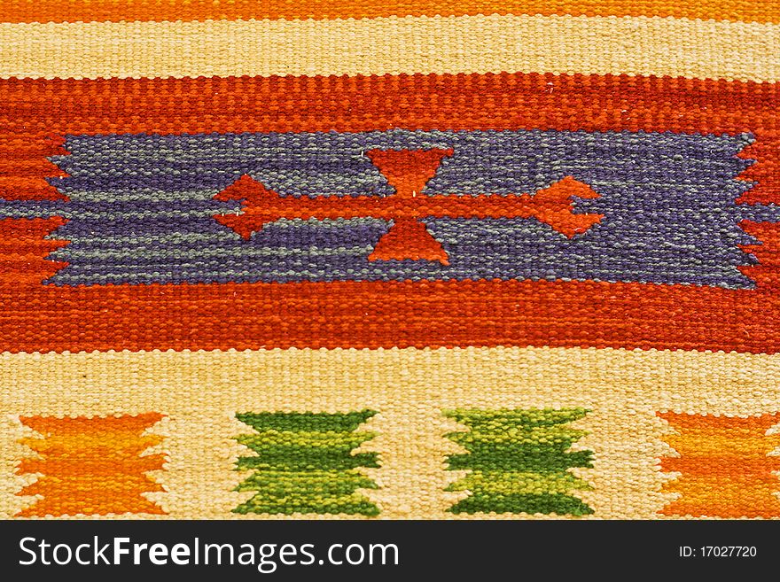 Landscape view of colored textile on a carpet background. Landscape view of colored textile on a carpet background