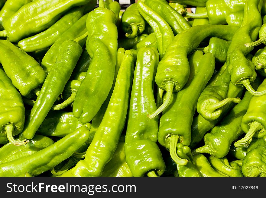 Landscape view of green peppers background. Landscape view of green peppers background