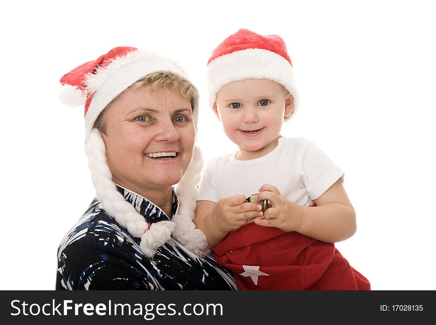 Grandmother and grandchild are wearing christmas suits. Grandmother and grandchild are wearing christmas suits