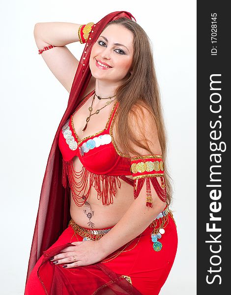 Arabic dancer in traditional red dress
