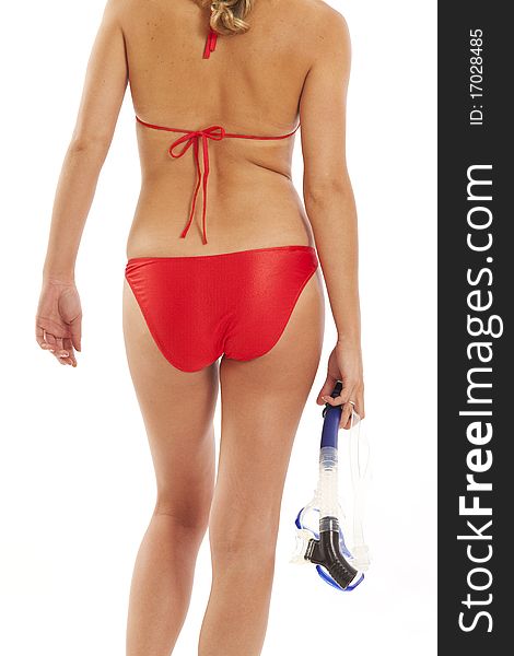 Back side of young woman in red bikini holding a snorkel. Back side of young woman in red bikini holding a snorkel