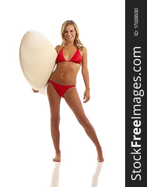 Portrait of young woman in red bikini holding surfboard. Portrait of young woman in red bikini holding surfboard