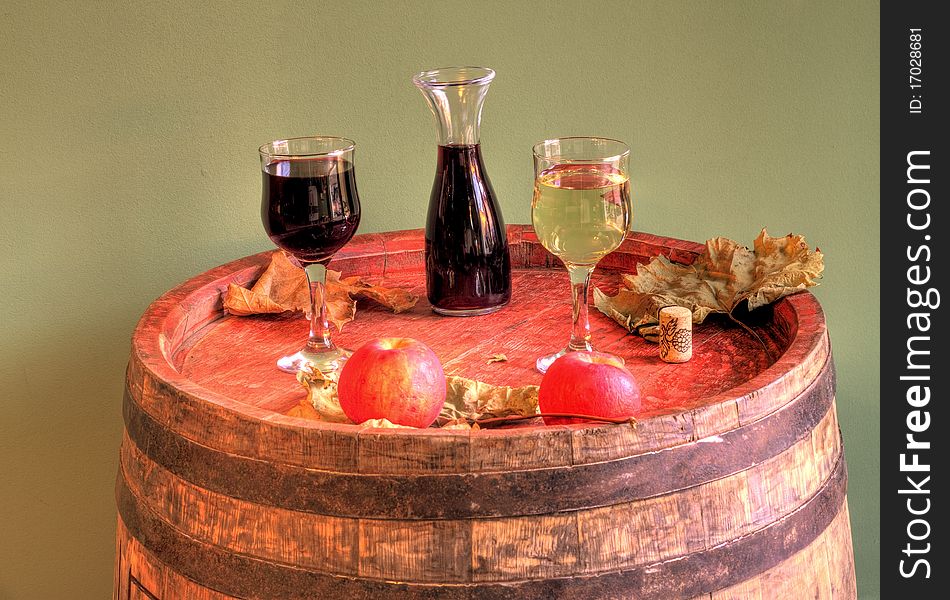 Autumn.. red and white wine on a barrel