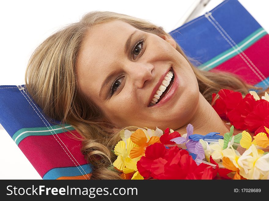 Young woman relaxing in beach chair