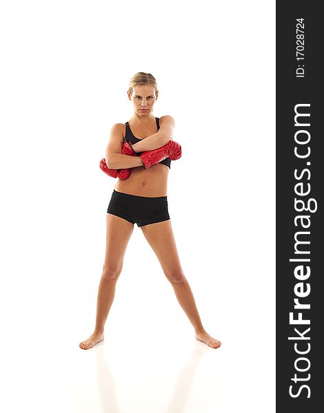 Young woman with red boxing gloves