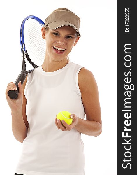 Young woman with tennis racket and ball