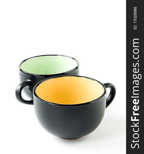 Two black cups isolated on a white background