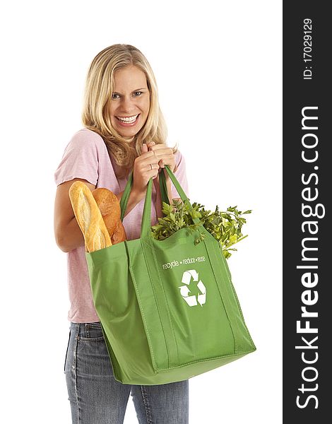 Young woman with groceries in recycle bag