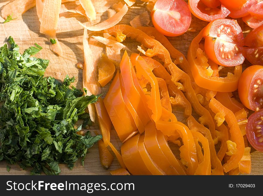 Slices of tomatoes peppers and parsley