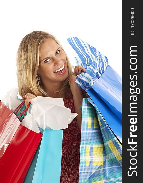 Close up portrait of young woman with shopping bags