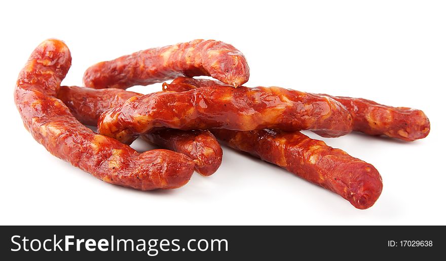 Smoked sausages isolated on white background. Smoked sausages isolated on white background