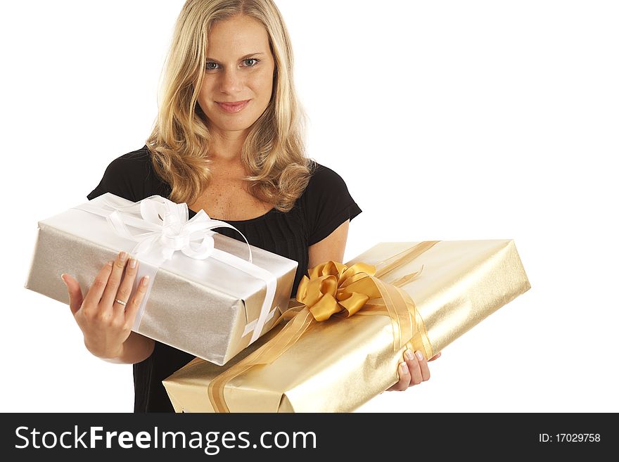 Young woman in black holding elegant gold and silver presents. Young woman in black holding elegant gold and silver presents