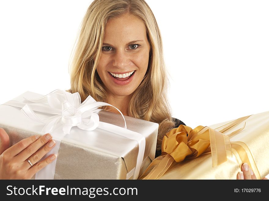 Young woman in black holding elegant gold and silver presents. Young woman in black holding elegant gold and silver presents