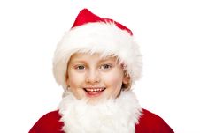 Young Santa Claus Child With Fur Cap Smiles Happy Royalty Free Stock Photography Young Santa Claus Child With Fur Cap Smiles Happy Royalty Free Stock Photography