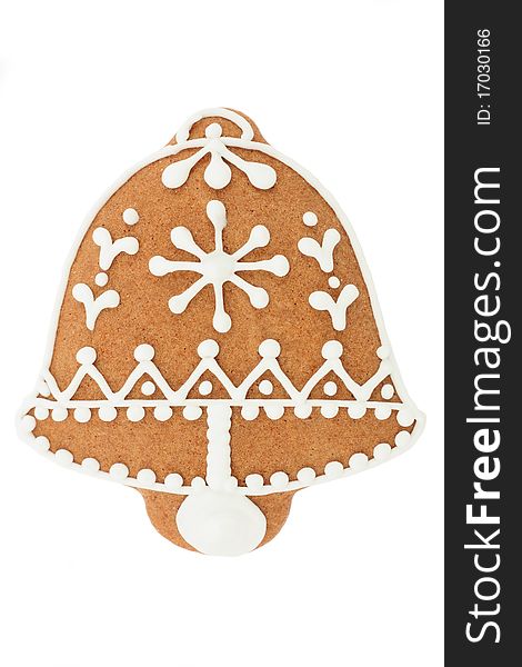 Decorated christmas gingerbread bell on a white background.